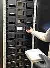 Cerabyte cartridge and library rack with cartridge drawers