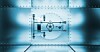 A blue-toned metal vault door with a circular locking mechanism set in a riveted steel wall